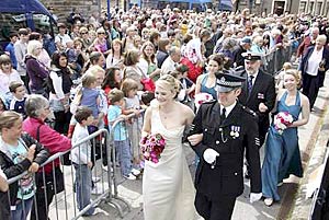 Shopping Week Queen Lara Hourie is escorted to the Town House by Sergeant Gordon Deans (The Orcadian/Orkney Media Group)