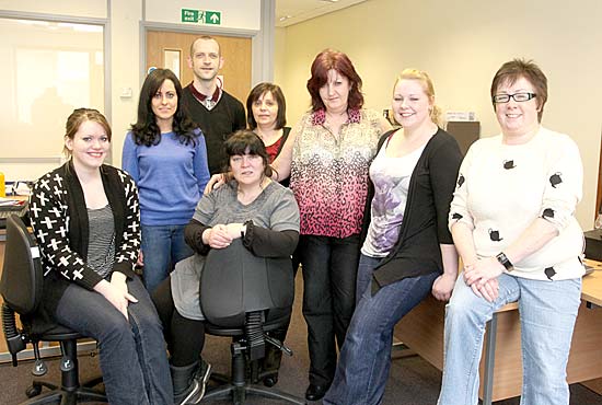 Front row: Kim Anderson, Hannah Rosie, Jackie Douglas, Lorna Swannie, Keira Nicol (all support workers) and Carol Taylor Back row: Declan Brandriff (service manager from Scottish Autism) and Annmarie O'Donnell. (Implementation Manager Scottish Autism).
