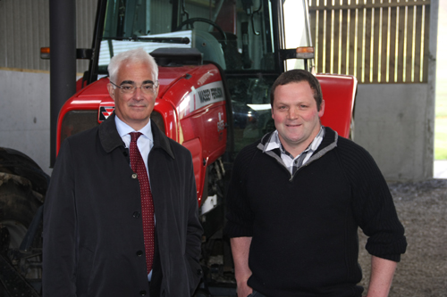 Former Chancellor of the Exchequer, Alistair Darling (left) meets local farmer Al Watson.