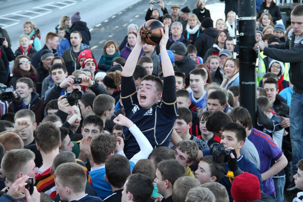 Doonie Robbie Hay is held aloft with his ba'