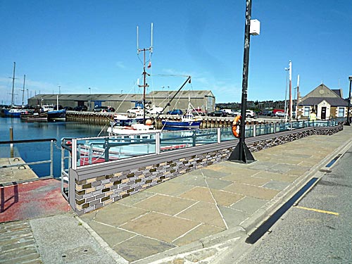 A view of the Kirkwall basin with an artist's impression of the Phase 2 flood defences.
