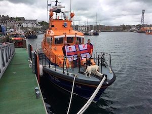 The cyclists on board Wick Lifeboat this afternoon, Friday.