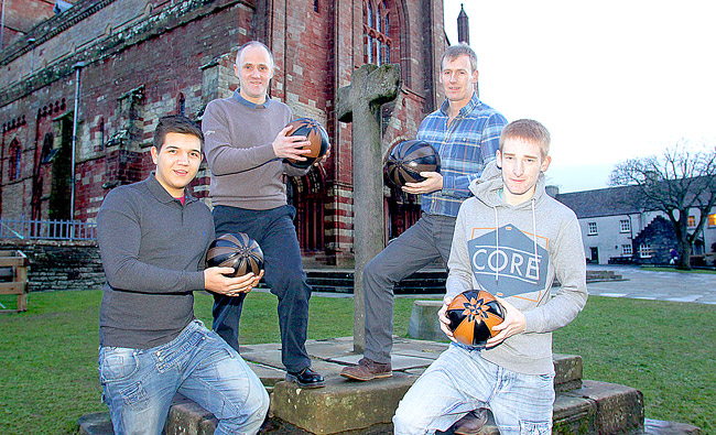 Last season's ba' winners at the Mercat Cross, Kirkwall. From the left: Aiden Drever (Doonie), Peter McKinlay (Doonie), Ross Linklater (Uppie) and Greg Scott (Doonie). (www.theorcadianphotos.co.uk)