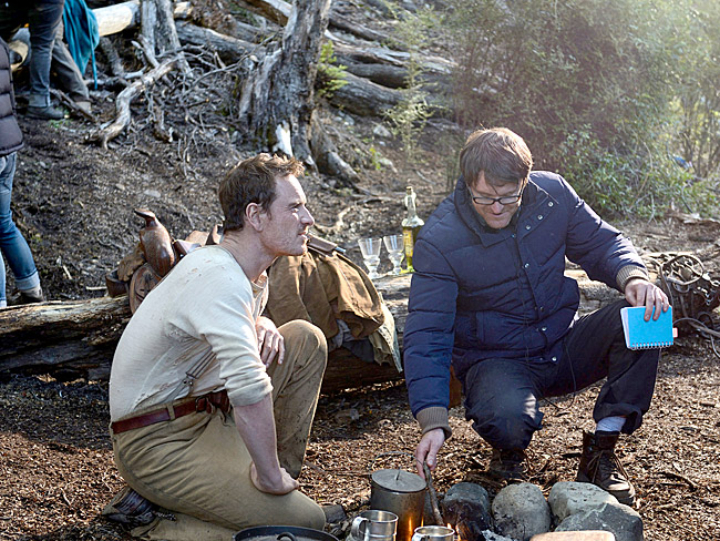 Actor, Michael Fassbender (left) with director John Maclean on location for 'Slow West'.