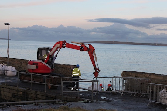 Local contractors Leask Marine pictured carrying out repair work on the pier earlier this week. (Picture: Anne Byers) 