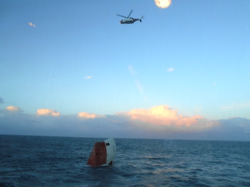 A Coastguard helicopter pictured over the Cemfjord.