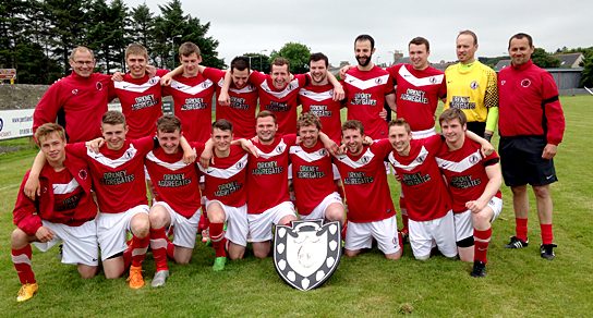 Orkney's footballers and coaching team celebrate following last weekend's Archer Shield victory.