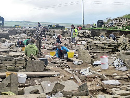 Excavation work under way in Structure Eight at the Ness of Brodgar.