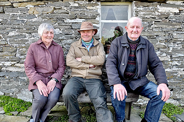 Paul Murton with Jim and Rona Towrie, during his visit to The Croft, in Sanday, this summer. (Timeline Films)