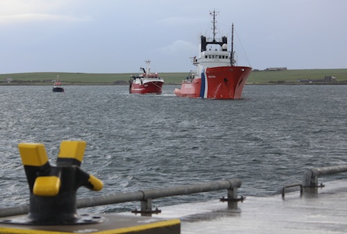 The Coastguard tug and the Russa Taign arrive at Hatston Pier this morning.